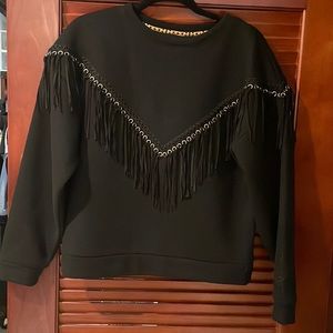 Black crew neck sweatshirt with fringe detail. Hayley Menzies